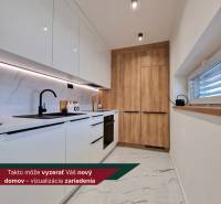 White kitchen with wood decor and marble flooring in a 3-room apartment.
