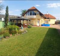 Family house on Nitrianska Street in Nové Zámky with a gazebo and a pond.