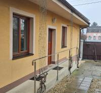 A family house in Bratislava-Podunajské Biskupice with an outdoor terrace and an enclosed yard.