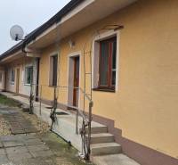 A family house in Bratislava - Podunajské Biskupice with an elevated entrance and a satellite dish.