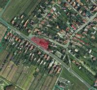 Satellite view of agricultural and forest lands in the village of Hozelec with parcel numbers.