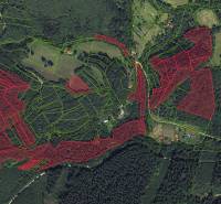 Aerial view of agricultural and forest lands in Lazy pod Makytou with marked parcels.
