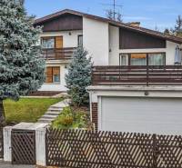 A family house in Bratislava-Ružinov on Fibichova Street, with a spacious garden and a garage.
