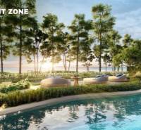 Apartment construction in Phuket near the beach with a swimming pool and plenty of greenery.