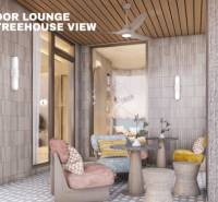 A view of a semi-open lounge with apartment construction and wooden decor.