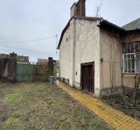 Family house on SNP Street in Šahy, older facade, garden, gate.