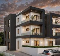 The exterior of a holiday apartment in Pula with terraces and surrounding greenery at sunset.