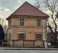 A family house on Levická Street in Vráble with a brick facade and a sloped roof.