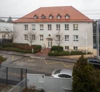 The building with a red roof on Úprkova Street in Bratislava - Ružinov.