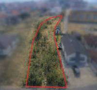 A plot for residential use in Horné Orešany with marked boundaries on an aerial photograph.