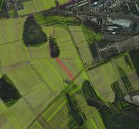 Aerial view of agricultural and forest land around Ižkovce.