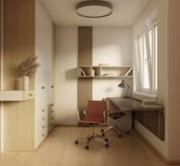 A workspace in a 2-room apartment with a wooden decor floor, a desk, a chair.