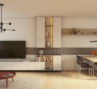 Living room in a two-room apartment with wooden decor flooring, a large TV, and a dining table.