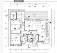 Floor plan of a family house with room layout and dimensions.