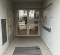 Entrance on Školská Street in Chorvátsky Grob, 2-room apartment, mailboxes.