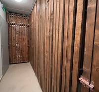 A storage space with wooden walls in a 3-room apartment.