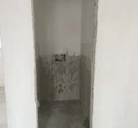 An unfinished room in a 3-room apartment prepared for equipment installation.