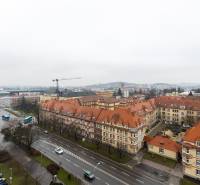 A view of historic buildings on Štúrova Street in Nitra with traffic.