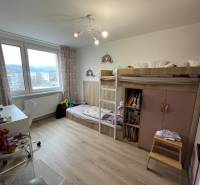Children's room with a bunk bed in a 4-room apartment, floor with wooden decor.