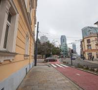 View of Dunajská Street in Bratislava - Old Town with high-rise buildings.