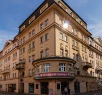 A historic building on the corner of Grösslingová Street in Bratislava - Old Town with sunny weather.