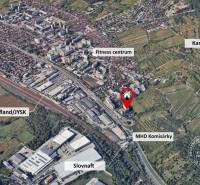 A view of the location Bratislava - Rača, Karpatské námestie, with nearby amenities and nature.