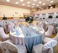 A well-organized wedding reception with romantic blue decorations suitable for hotels and guesthouses.