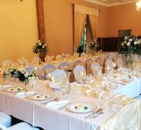 Banquet room with decorations and festively set tables in hotels and guesthouses.