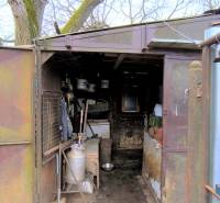 An older shelter on a residential plot on Mierová Street in Krásnohorské Podhradie.