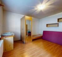 Interior of a family house with a wooden decor floor and furniture.