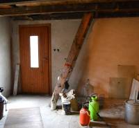 Interior of a family house with improvised elements and garden sprinklers.