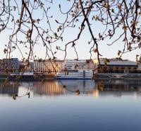 Panorama of Bratislava from the Old Town, view of Rázusovo Embankment with the reflection of the river.