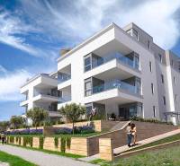 Recreational apartment in the town of Pag with terraces and greenery in a landscaped exterior.