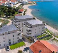 Apartment in Pag near the beach, with a view of the sea and surrounding landscape.