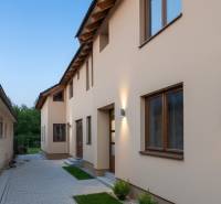 A family house in Chrenová, Nitra with a landscaped yard and facade.