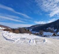Snow-covered cottages and hills in the Recreation Land area, Fongrub, Mýto pod Ďumbierom.