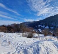 Snow-covered landscape in Mýto pod Ďumbierom, on plots in the Fongrub area.