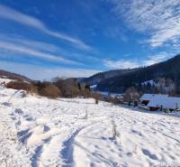 Winter landscape with snow-covered cottages in the Recreational Grounds of Mýto pod Ďumbierom, Fongrub.