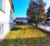 A family house on Sadová Street in Borský Mikuláš with a spacious garden and trees.