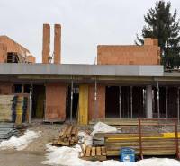 Construction of a family house on Višňová Street in Višňové, bricks, building material, snow cover.
