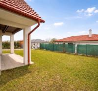 Garden in Most pri Bratislave on Záleská Street near a family house with a brick roof.