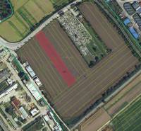 Commercial land in Pruské from above, with visible parcel numbers and surrounding infrastructure.