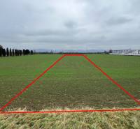 Commercial land for sale in Pruské, highlighted plot on a vast green area.