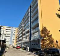 Apartment building on Tilgnerova Street in Bratislava - Karlova Ves with parking spaces.
