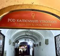 Entrance to the gastro premises on Sedlárska Street in the historical center of Bratislava.