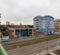 Kazanská Street in Bratislava - Podunajské Biskupice, row buildings along the road.