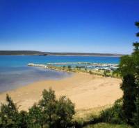 Sandy beach near residential plots in the coastal area of Ljubač in Ljubač.