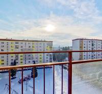 Winter on the housing estate, view of the apartment buildings from the balcony of a 3-room apartment on Mierová Street.