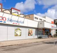 Tesco supermarket on Tatranská Street, near apartment buildings and a parking lot.