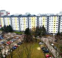 Residential apartment buildings on Znievska Street in Bratislava - Petržalka with a parking lot.